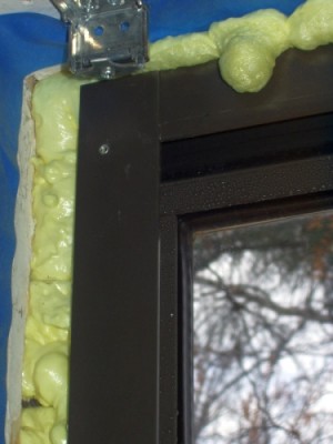 Window frame with spray foam Window frame with spray foam